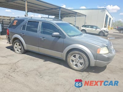 Czwarte zdjęcie samochodu z boku: 2005 FORD FREESTYLE SEL VIN:1FMDK02135GA04068 - miniatura