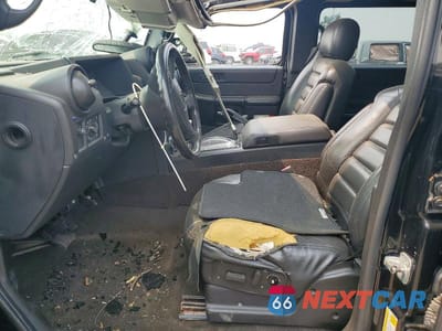 Zdjęcie 7 z 13 samochodu: 2006 HUMMER H2 VIN:5GRGN23UX6H122495 - miniatura