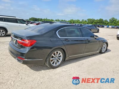 Trzecie zdjęcie samochodu z tyłu: 2018 BMW 740 I VIN:WBA7E2C5XJG742446 - miniatura