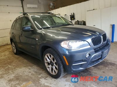 Czwarte zdjęcie samochodu z boku: 2011 BMW X5 XDRIVE35I VIN:5UXZV4C54BL412378 - miniatura