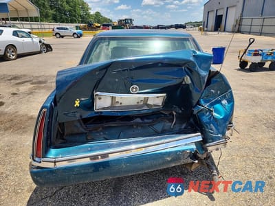 Zdjęcie 6 z 12 samochodu: 1995 CADILLAC DEVILLE VIN:1G6KD52B1SU279384 - miniatura