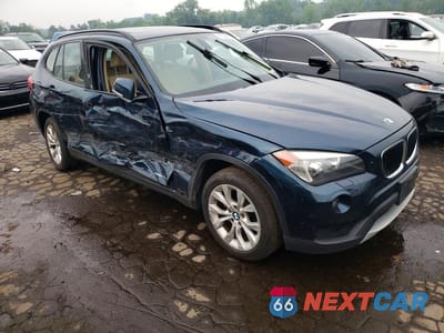 Czwarte zdjęcie samochodu z boku: 2013 BMW X1 XDRIVE28I VIN:WBAVL1C54DVR92482 - miniatura