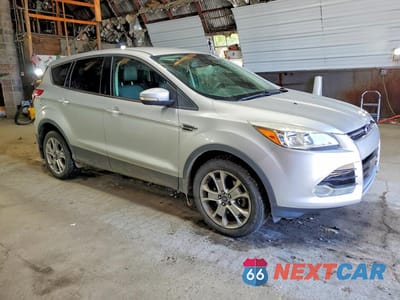Czwarte zdjęcie samochodu z boku: 2013 FORD ESCAPE SEL VIN:1FMCU9HX0DUB59585 - miniatura