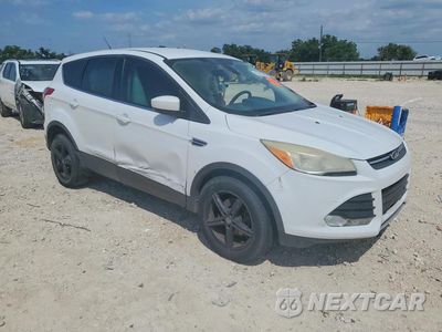 Czwarte zdjęcie samochodu z boku: 2014 FORD ESCAPE SE VIN:1FMCU0GX2EUB81442 - miniatura