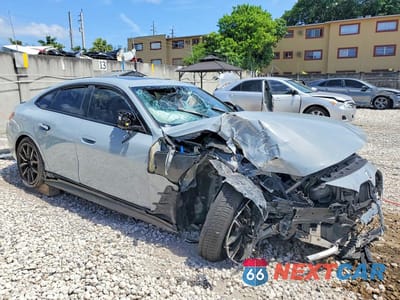 Czwarte zdjęcie samochodu z boku: 2023 BMW M440XI GRAN COUPE VIN:WBA13AW02PFN45680 - miniatura
