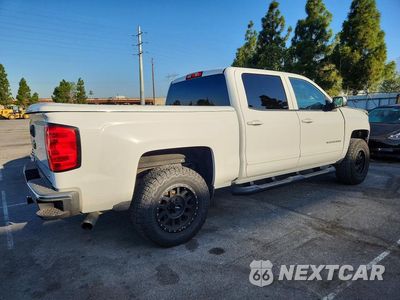 Trzecie zdjęcie samochodu z tyłu: 2018 CHEVROLET SILVERADO C1500 LT VIN:3GCPCREC4JG217710 - miniatura