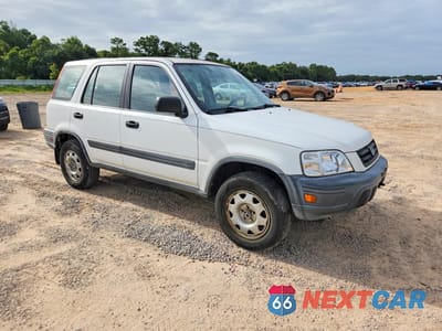 Czwarte zdjęcie samochodu z boku: 1999 HONDA CR-V LX VIN:JHLRD2846XC003785 - miniatura