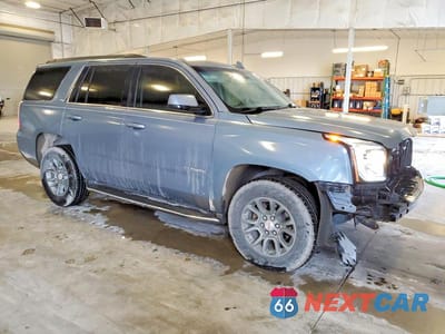 Czwarte zdjęcie samochodu z boku: 2016 GMC YUKON SLT VIN:1GKS2BKC2GR293707 - miniatura