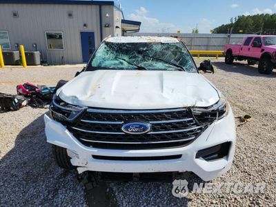 Piąte zdjęcie samochodu w środku: 2021 FORD EXPLORER XLT VIN:1FMSK7DH2MGB19902 - miniatura