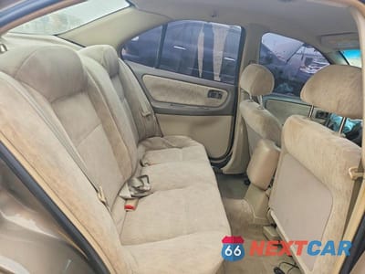 Zdjęcie 10 z 13 samochodu: 1999 NISSAN ALTIMA XE VIN:1N4DL01D5XC124340 - miniatura