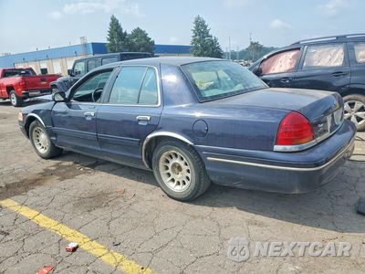 Drugie zdjęcie samochodu z przodu: 1999 FORD CROWN VICTORIA LX VIN:2FAFP74W5XX101274 - miniatura