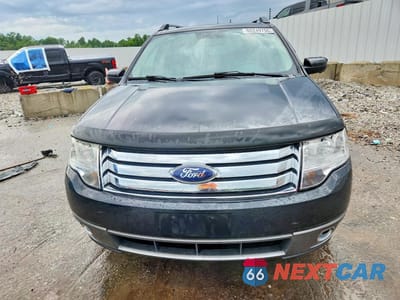Piąte zdjęcie samochodu w środku: 2009 FORD TAURUS X SEL VIN:1FMDK02W79GA02454 - miniatura