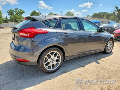Trzecie zdjęcie samochodu z tyłu: 2015 FORD FOCUS SE VIN:1FADP3K20FL363683 - miniatura