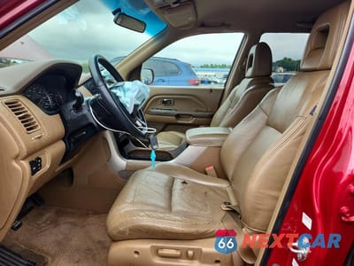 Zdjęcie 7 z 13 samochodu: 2004 HONDA PILOT EXL VIN:2HKYF18554H549631 - miniatura