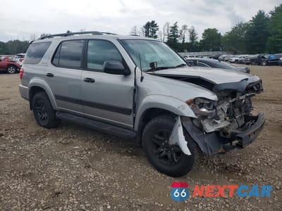Czwarte zdjęcie samochodu z boku: 2003 TOYOTA SEQUOIA LIMITED VIN:5TDBT48A23S184430 - miniatura