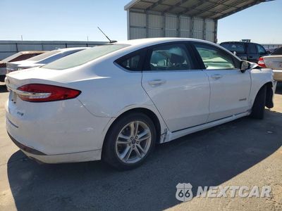 Trzecie zdjęcie samochodu z tyłu: 2018 FORD FUSION S HYBRID VIN:3FA6P0UU1JR177800 - miniatura
