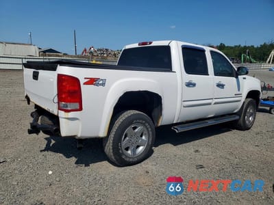 Trzecie zdjęcie samochodu z tyłu: 2010 GMC SIERRA K1500 SLT VIN:3GTRKWE37AG263221 - miniatura