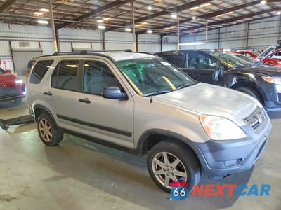 Czwarte zdjęcie samochodu z boku: 2004 HONDA CR-V LX VIN:JHLRD68404C024098 - miniatura