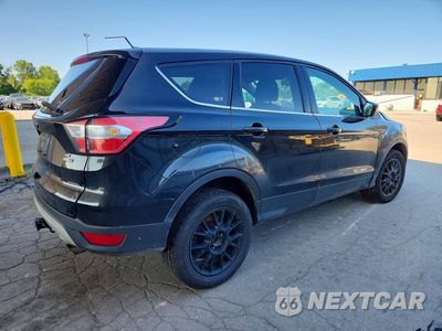 Trzecie zdjęcie samochodu z tyłu: 2017 FORD ESCAPE SE VIN:1FMCU9G93HUD30628 - miniatura