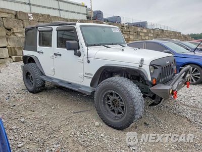 Czwarte zdjęcie samochodu z boku: 2013 JEEP WRANGLER UNLIMITED SPORT VIN:1C4BJWDG7DL543074 - miniatura