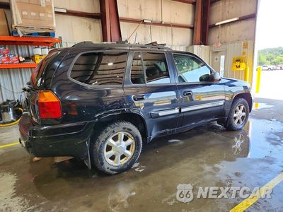 Trzecie zdjęcie samochodu z tyłu: 2005 GMC ENVOY VIN:1GKDT13S152374094 - miniatura