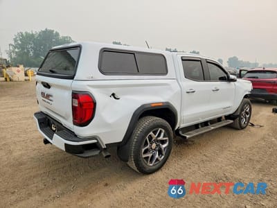 Trzecie zdjęcie samochodu z tyłu: 2024 GMC CANYON DENALI VIN:1GTP6FEK0R1294484 - miniatura