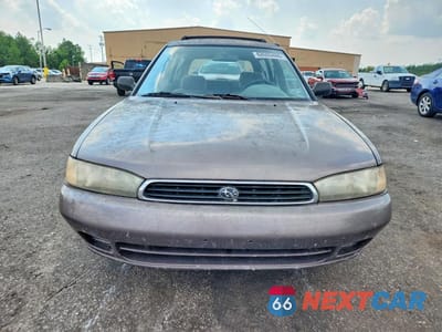 Piąte zdjęcie samochodu w środku: 1996 SUBARU LEGACY L VIN:4S3BK4350T7308959 - miniatura