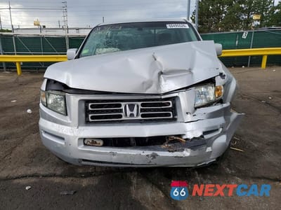 Piąte zdjęcie samochodu w środku: 2006 HONDA RIDGELINE RTL VIN:2HJYK16526H547440 - miniatura