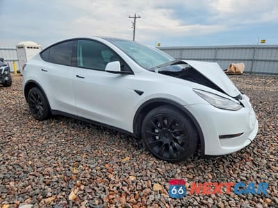 Czwarte zdjęcie samochodu z boku: 2022 TESLA MODEL Y VIN:7SAYGDEE6NA016352 - miniatura