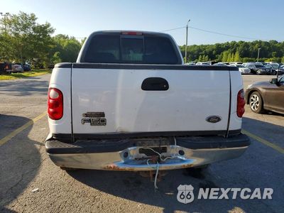 Zdjęcie 6 z 12 samochodu: 2001 FORD F150 SUPERCREW VIN:1FTRW08L41KF49131 - miniatura