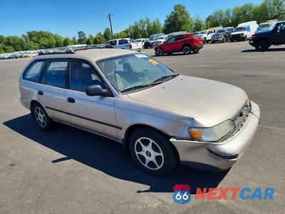 Czwarte zdjęcie samochodu z boku: 1994 TOYOTA COROLLA DX VIN:JT2AE09V5R0048149 - miniatura