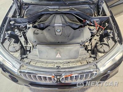Zdjęcie 12 z 13 samochodu: 2014 BMW X5 XDRIVE50I VIN:5UXKR6C50E0J71698 - miniatura