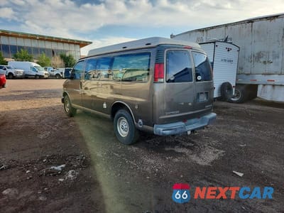 Trzecie zdjęcie samochodu z tyłu: 1999 CHEVROLET EXPRESS G3500 VIN:1GCHG35R8X1107292 - miniatura
