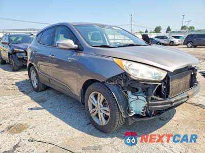 Czwarte zdjęcie samochodu z boku: 2012 HYUNDAI TUCSON GLS VIN:KM8JU3ACXCU515258 - miniatura