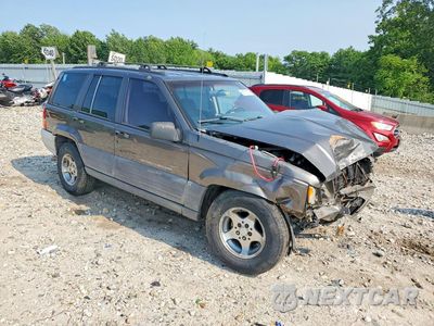 Czwarte zdjęcie samochodu z boku: 1998 JEEP GRAND CHEROKEE LAREDO VIN:1J4GZ58S1WC300252 - miniatura