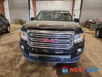 Piąte zdjęcie samochodu w środku: 2016 GMC CANYON SLE VIN:1GTG6CE31G1175685 - miniatura