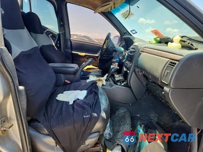 Zdjęcie 7 z 13 samochodu: 2000 JEEP GRAND CHEROKEE LAREDO VIN:1J4G248S9YC160498 - miniatura