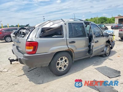 Trzecie zdjęcie samochodu z tyłu: 2001 JEEP GRAND CHEROKEE LAREDO VIN:1J4GW48N11C582026 - miniatura
