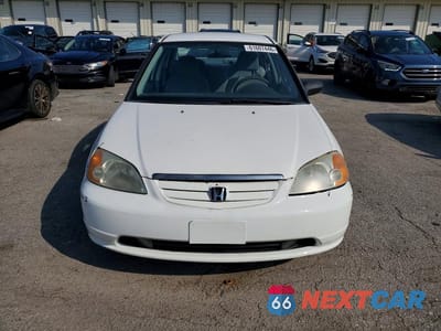 Piąte zdjęcie samochodu w środku: 2001 HONDA CIVIC LX VIN:1HGES16591L018085 - miniatura
