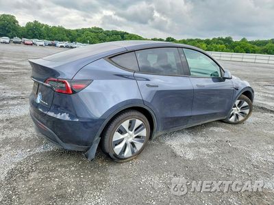 Trzecie zdjęcie samochodu z tyłu: 2023 TESLA MODEL Y VIN:7SAYGDEE2PA163786 - miniatura