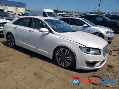 Czwarte zdjęcie samochodu z boku: 2017 LINCOLN MKZ RESERVE VIN:3LN6L5F91HR663525 - miniatura