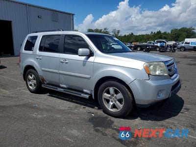 Czwarte zdjęcie samochodu z boku: 2009 HONDA PILOT EXL VIN:5FNYF38579B022725 - miniatura