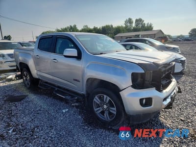 Czwarte zdjęcie samochodu z boku: 2015 GMC CANYON SLE VIN:1GTG6BE31F1182550 - miniatura