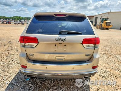 Zdjęcie 6 z 13 samochodu: 2014 JEEP GRAND CHEROKEE SUMMIT VIN:1C4RJEJT2EC359592 - miniatura
