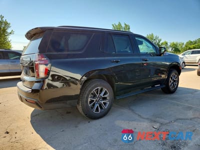 Trzecie zdjęcie samochodu z tyłu: 2021 CHEVROLET TAHOE K1500 Z71 VIN:1GNSKPKD1MR279429 - miniatura