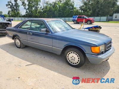 Czwarte zdjęcie samochodu z boku: 1987 MERCEDES-BENZ 560 SEC VIN:WDBCA45D4HA304613 - miniatura