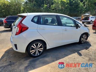 Trzecie zdjęcie samochodu z tyłu: 2016 HONDA FIT EX VIN:JHMGK5H77GX013951 - miniatura