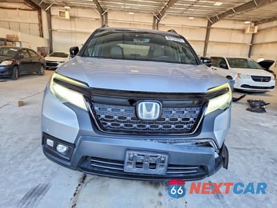 Piąte zdjęcie samochodu w środku: 2019 HONDA PASSPORT TOURING VIN:5FNYF7H97KB000403 - miniatura