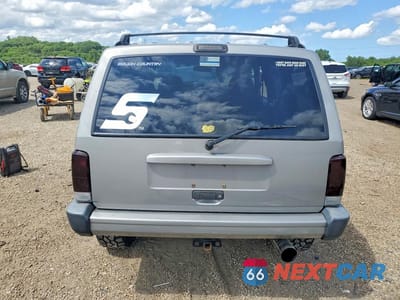 Zdjęcie 6 z 14 samochodu: 2001 JEEP CHEROKEE SPORT VIN:1J4FF48S91L539801 - miniatura