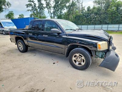 Czwarte zdjęcie samochodu z boku: 2005 DODGE DAKOTA QUAD VIN:1D7HE28NX5S223857 - miniatura